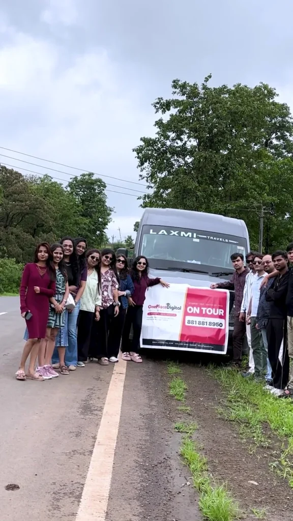 OnePlace Batch of 2026 with the tour bus on their batch trip